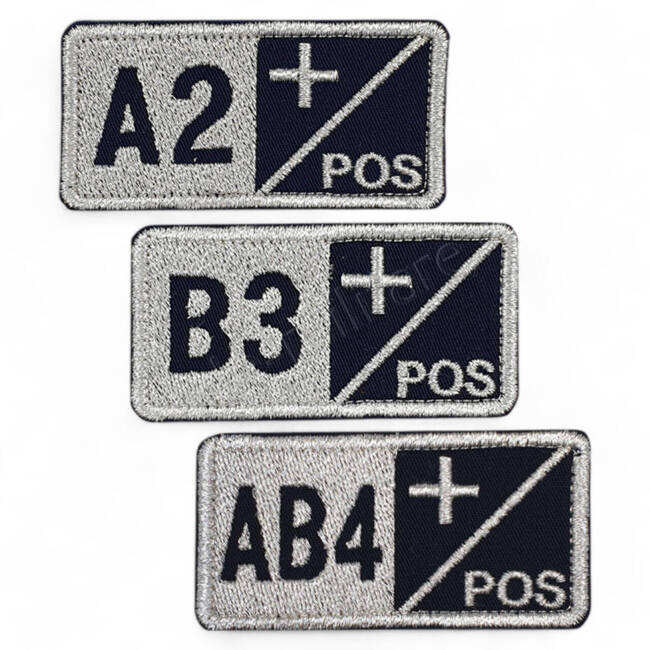 Blood group 0+ badge embroidered on ultramarine with metallic thread - sewing application