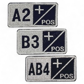 Blood group B+ badge embroidered on ultramarine with metallic thread - sewing application